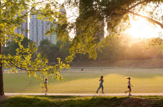 A few running women on a park trail